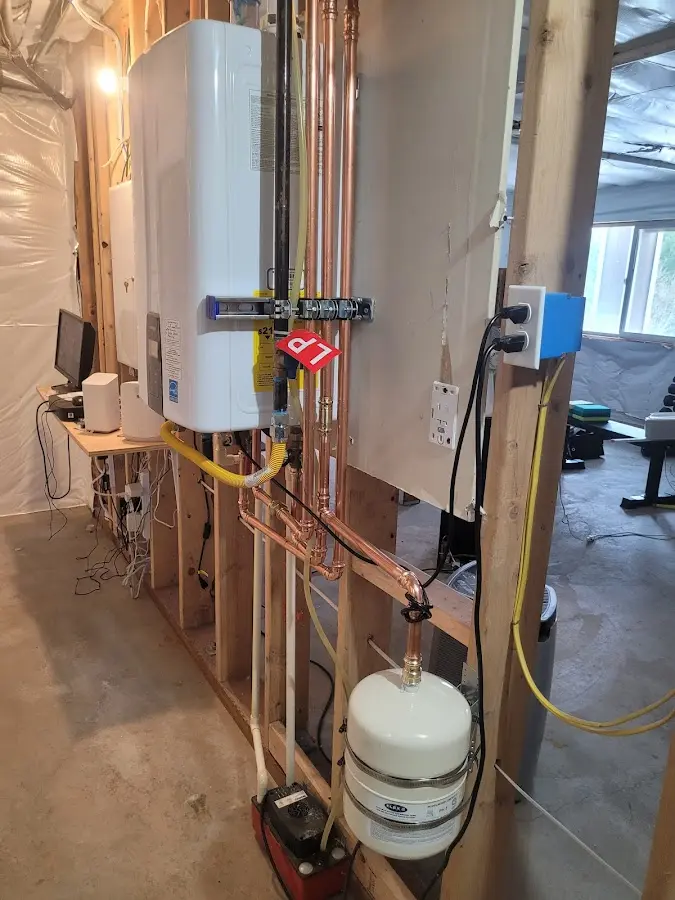 Licensed plumber repairing a kitchen sink in Kapaa